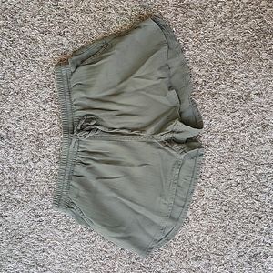 Army green loose fit beach shorts. Size XS.